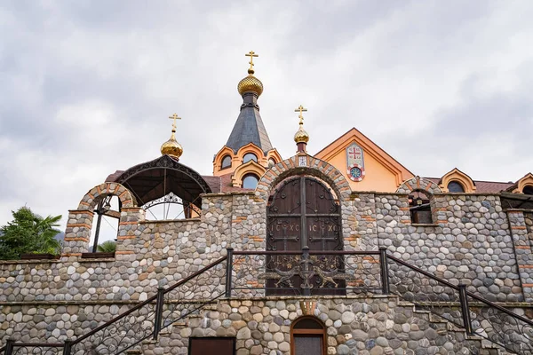 Ortodox Monastery of the Krestovaya Pustyn near Dagomys in cloudy day Immagine Stock