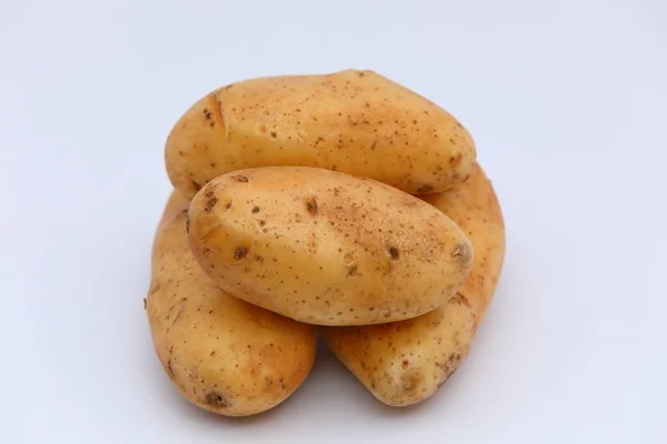 Potatos Freschi Impilati Sfondo Bianco — Foto Stock