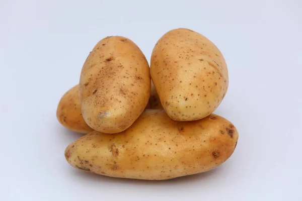 Potatos Freschi Impilati Sfondo Bianco — Foto Stock