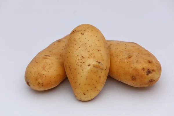 Potatos Freschi Impilati Sfondo Bianco — Foto Stock