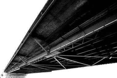A beautiful old green bridge with steel structures in the evening.Black and white