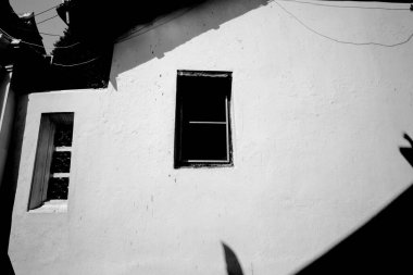 Windows of The monk's residence at Wat Thepthidaram Worawihan, built during the reign of Rama III, Rattanakosin, Bangkok, Thailand,Black and white