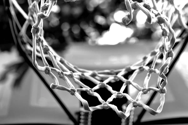 Hoop and net of basketball hoop in a strange view from the bottom,Black and Whit