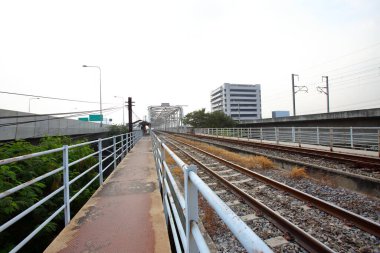 Structural steel bridge,Rama VI Bridge is a railway bridge over the Chao Phraya River in Bangkok,in Thailand,The form of a bridge in the olden days,often with steel structures.