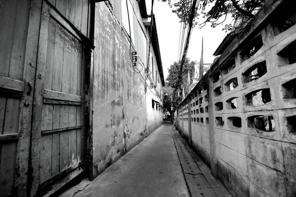 A pathway that people in the old market area that pass by in the area called Talat Noi Bangkok,Black and white