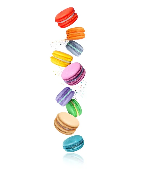 Macarons Colorés Avec Différentes Saveurs Dans Air Sur Fond Blanc — Photo