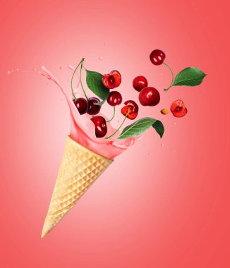 Splashes of ice cream with cherries on a red background