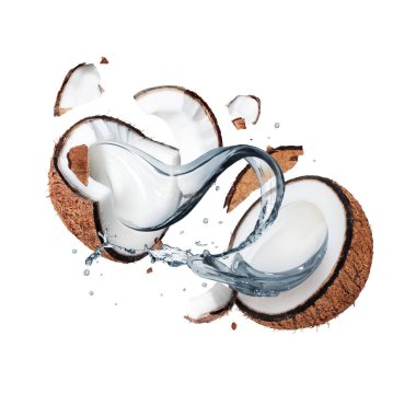 Meyve suyu ile ezilmiş hindistan cevizi, beyaz bir arka planda izole edilmiş havaya yakın bir şekilde sıçrıyor.