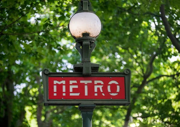 Metro sign of the French city of Paris, this means of transport runs throughout the city along the Seine River, this beautiful sign is located near the Place of Concorde in Paris.