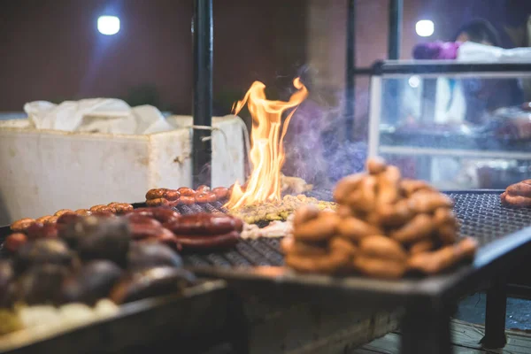 Meat and street food griddle fire in the square of Beni Mellal which is a city of Morocco, capital of the homonymous province and the region of Beni Mellal-Jenifra. Street food concept.