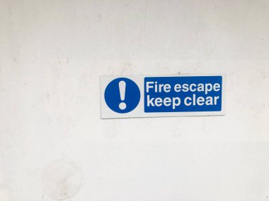 keep clear fire escape sign on white background