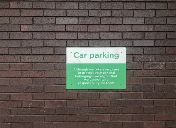 Green White Car Parking Sign Dark Brick Background — Stockfoto