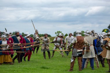 Tatton park, Knutsford Cheshire-united kingdom June 18 2016 combat re-enactment men and women in medieval costume to recreate historic battles