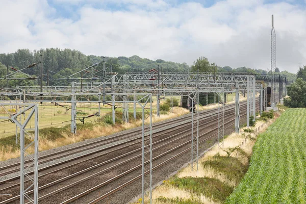Suspended Overhead Electric Power Train Lines Cables Railroad Track — Foto de Stock