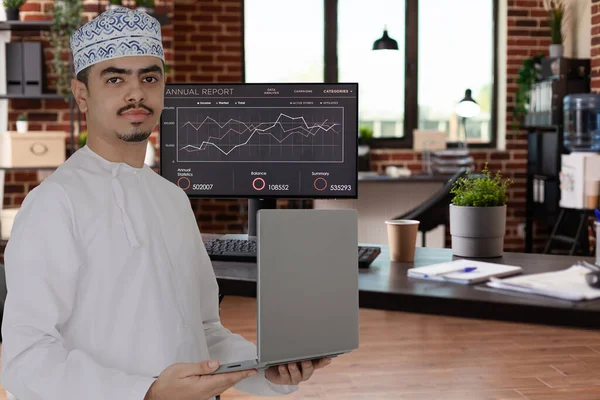 Omani Man Employee Office Holding Laptop — Stock Photo, Image