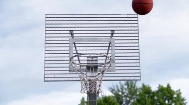 Basketball Player Throws Ball And Misses Hoop