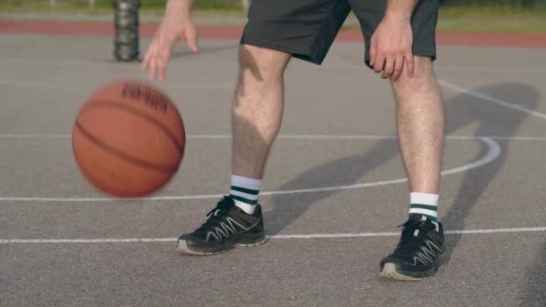 Dribbling Basketball Slow Motion Outdoor Court — ストック動画