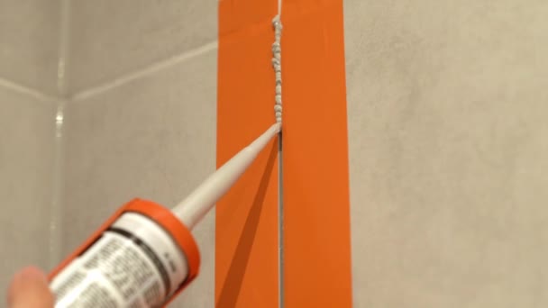 Worker Fills Gaps Tiles Silicone Sealant — стокове відео