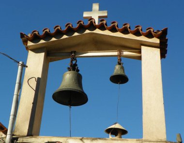 Athens, Greece, a gate with bells on the grounds of Library of Hadrian
