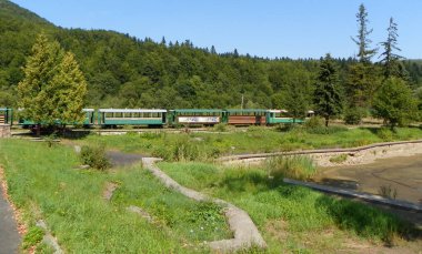 Ukraine, Carpathians, tourist train in the highlands