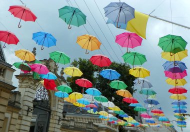 Ukraine, Lviv, Mykola Copernyka street, exhibition of colored umbrellas