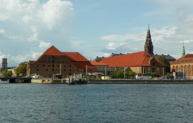 Denmark, Copenhagen, Langebrogade, view of the Christian IV's Brewhouse and the spire of the Christiansborg Palace