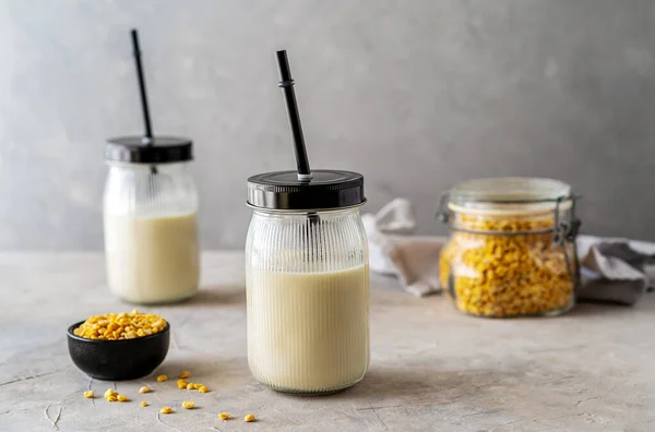 Vegan Healthy Plant Pea Milk Jars Drinking Straws Yellow Pea — стоковое фото