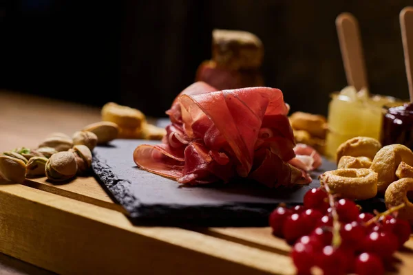 Composition Wooden Cutting Board Cold Cuts Cheeses Jams Mustard Berries — Stock Photo, Image