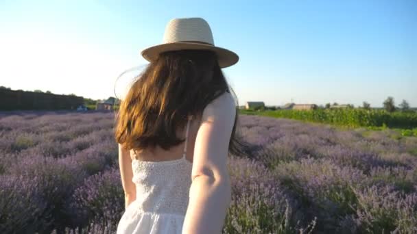 Attractive Woman Hat Holding Male Hand Walking Lavender Field Smiling — Video
