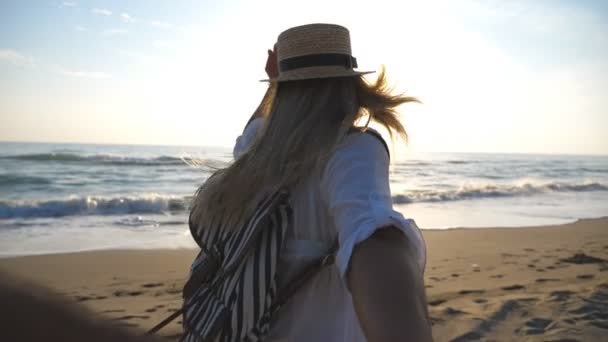 Beautiful Girl Shirt Backpack Holding Male Hand Running Empty Beach — Video