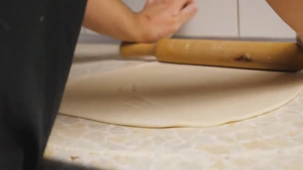 Close Arms Cook Unrolling Pastry Rolling Pin Kitchen Table Restaurant — Stock video