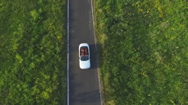 Aerial Shot White Convertible Car Riding Empty Rural Road Four — Stock Video