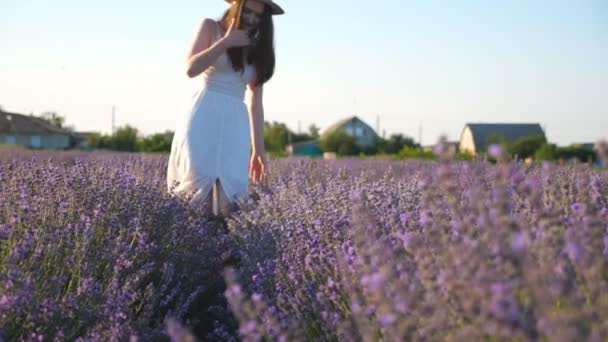 Young Woman Dress Walking Lavender Field Attractive Girl Wearing Hat — Stockvideo