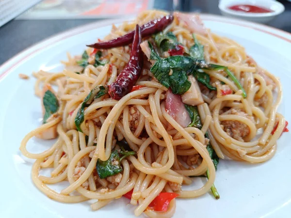 Spaghetti Spicy Pork Basil Thai Fusion Food Side View — стоковое фото