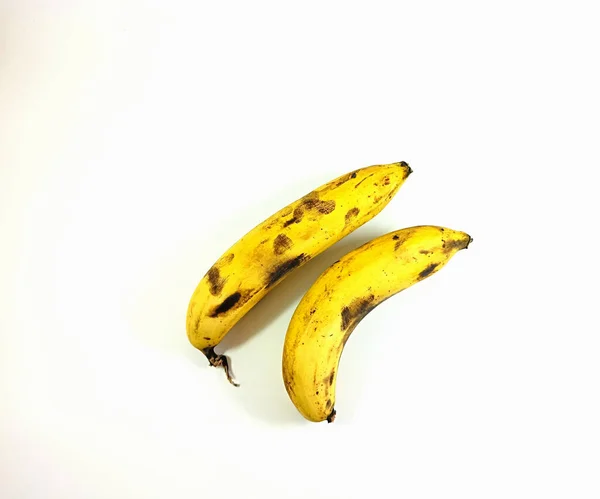 Banano Amarillo Estropeado Con Manchas Aisladas Sobre Fondo Blanco —  Fotos de Stock