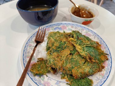 Muz çiçeği ya da muz yapraklı muz çiçeği.