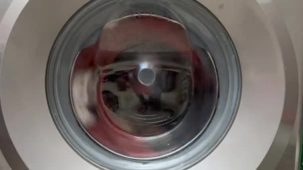 Washing Machine Full Clothes Rotating — Stock Video