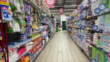 Plastic products on the shelves of an empty supermarket