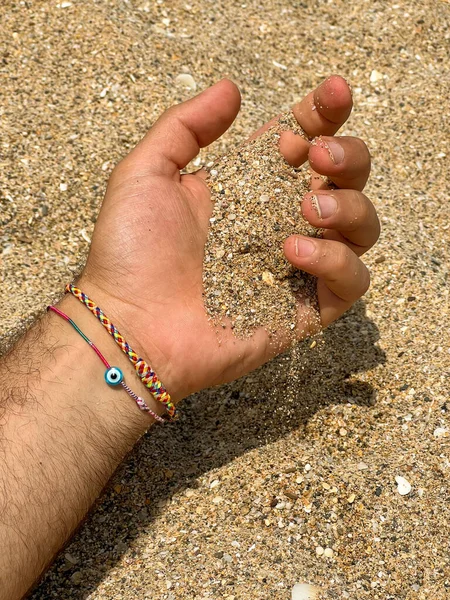 Male Hand Pouring Beach Sand Beach — Fotografia de Stock