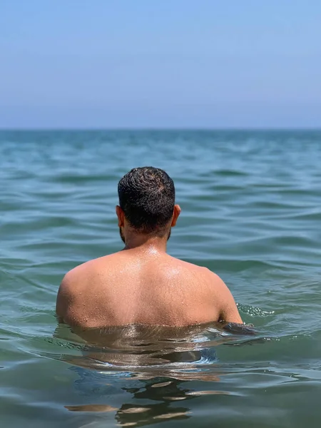 Muscular Man Standing Alone Middle Sea — Stockfoto