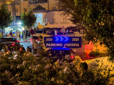 Blue parking sign on the roadside