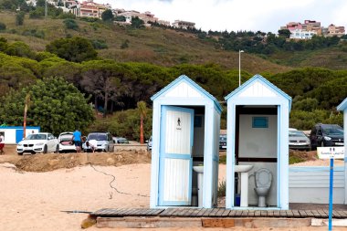 Wooden toilet free on the beach