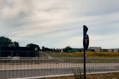 Car window view over the roadside of a freeway in Belgium