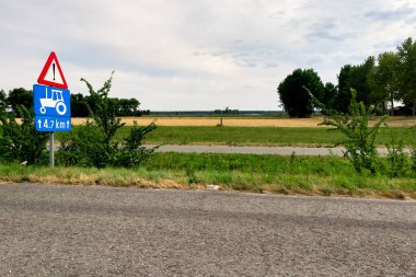 Car window view over the roadside of a freeway in Belgium
