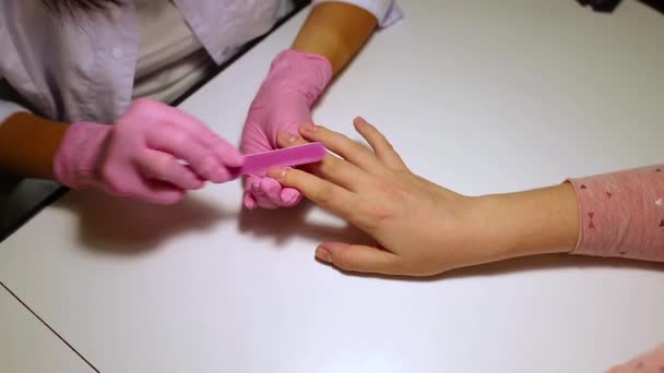 Manicurist Polishes Nails Nail File — Video Stock