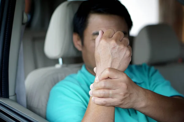 Concept Wrist Pain Long Driving Middle Aged Man Holds His — Stock Photo, Image