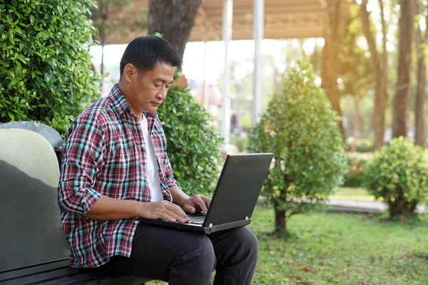 Asian Middle Aged Man Working Laptop Front Yard House Covid Stock Image