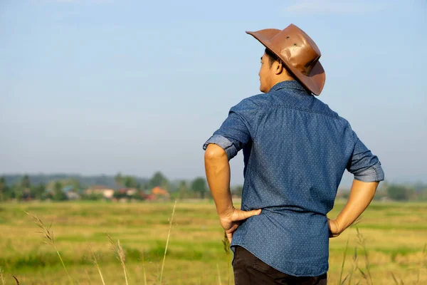Side View Asian Man Wear Leather Hat Blue Shirt Put — Stockfoto