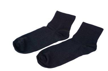 Pair of black socks isolated on white background. Concept : polite socks for men or women to wear to work, to school in formal uniform. Daily life costume.         