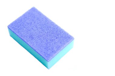 Colorful cleaning sponge for scrubbing dishes or other purposes on white background. Concept : household washing tools, equipment in kitchen.